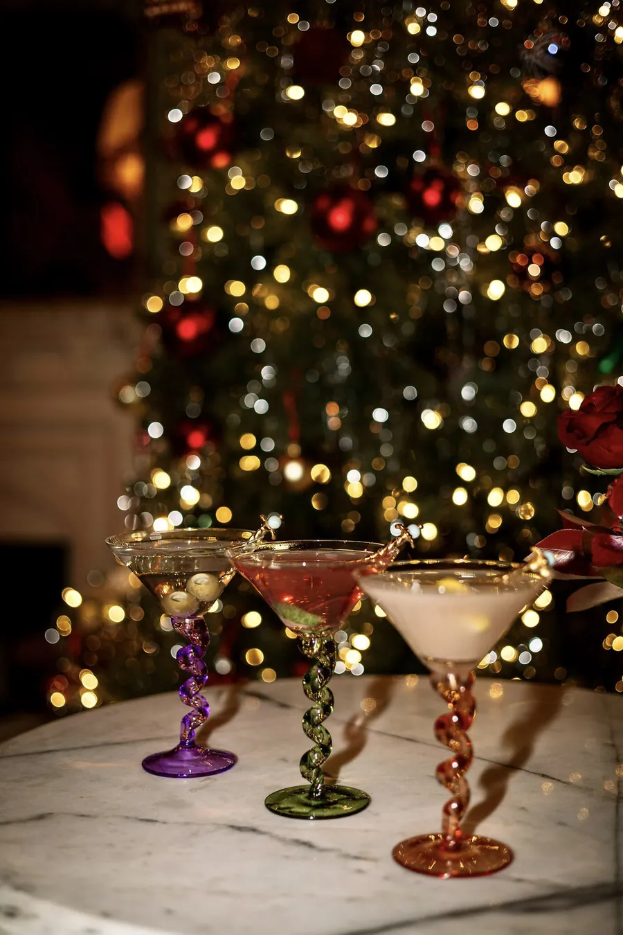 Cocktails on a marble table in front of the tree