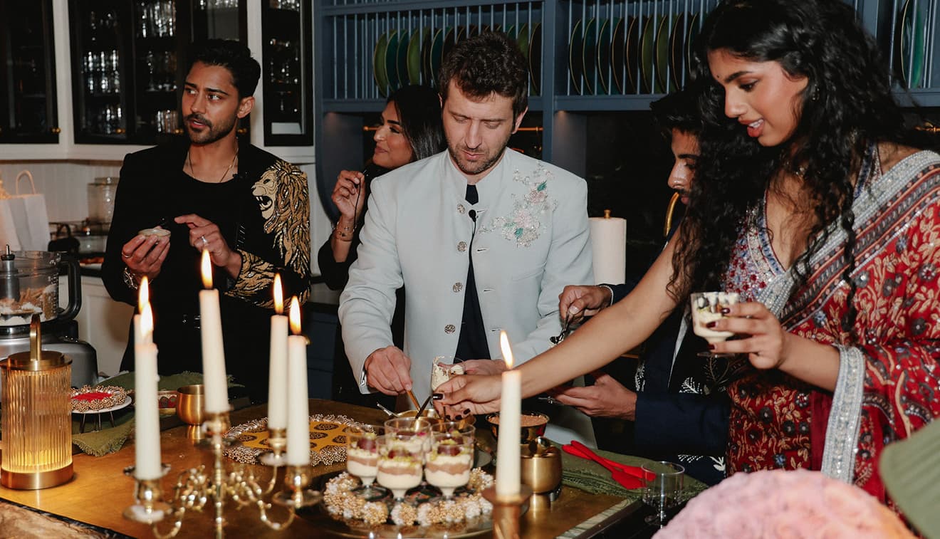 Guests gathered around a chef-led experience at Maxwell